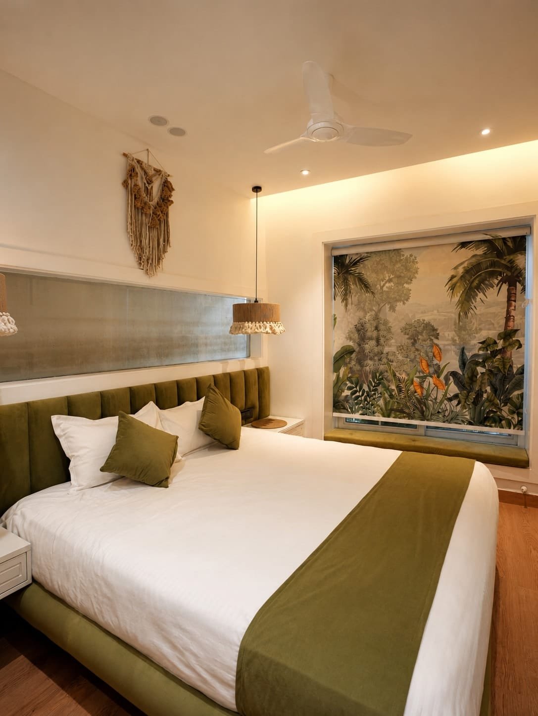 Bedroom 1 with an olive bed runner and a jungle-print mural